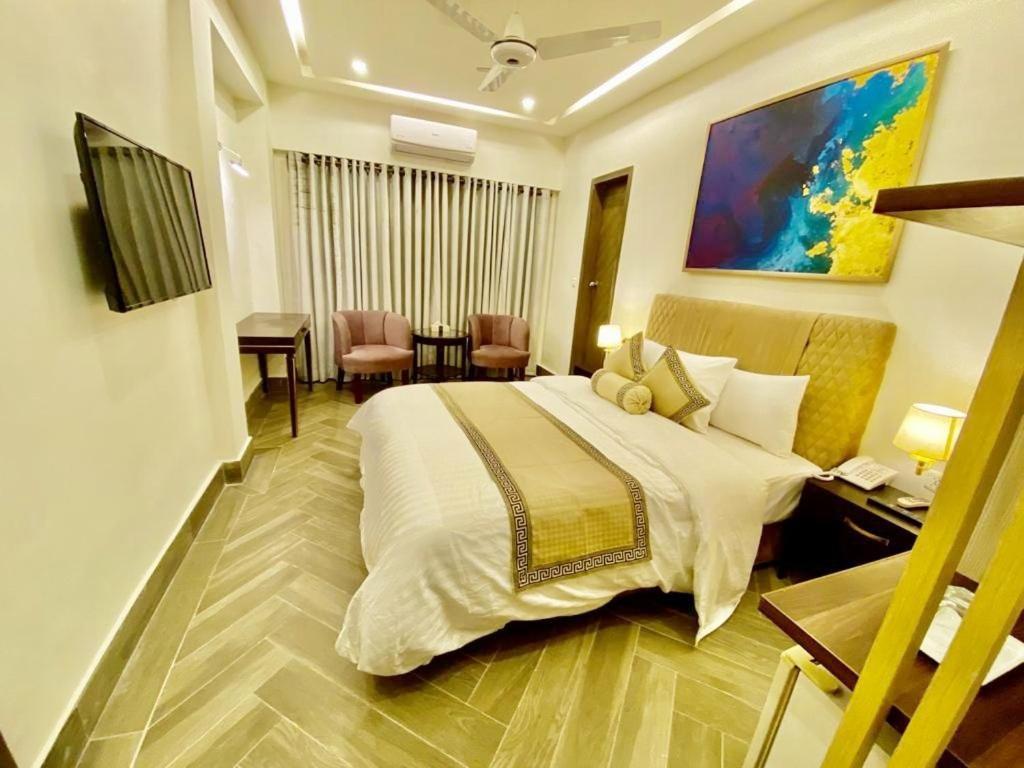 Shelton'S Rezidor House Hotel Peshawar Bagian luar foto